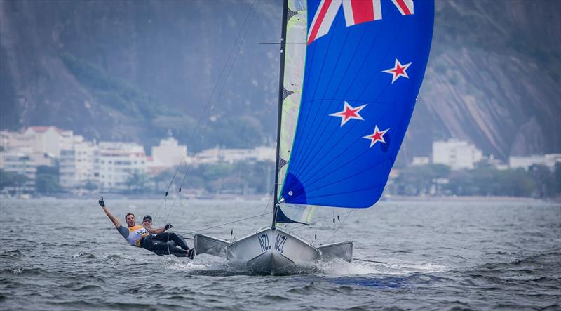 Blair Tuke and Peter Burling celebrate their Gold Medal win during the penultimate race in the 49er at the Rio Olympic Regatta photo copyright Emirates Team New Zealand taken at Iate Clube do Rio de Janeiro and featuring the 49er class