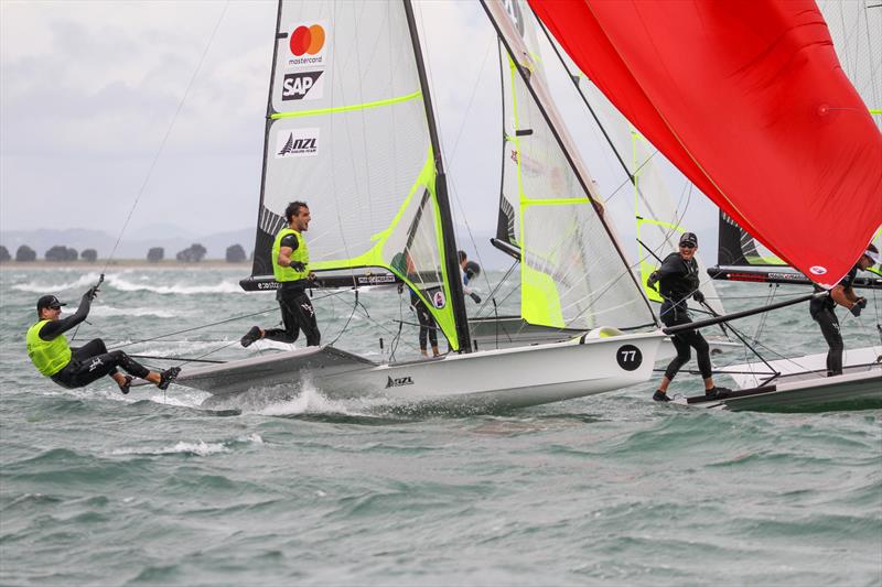 Logan Dunning Beck yells his congratulations to Peter Burling and Blair Tuke just after the two Kiwi crews cross the finsih line in the Medal Race - Hyundai Worlds. December 2019 - photo © Richard Gladwell / Sail-World.com