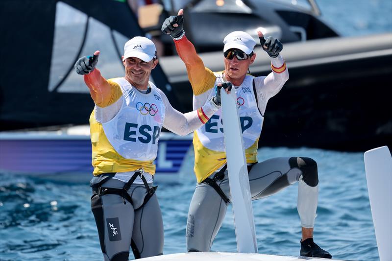 Diego Botin le Chever & Florian Trittel Paul (ESP) celebrate winning gold in the Men's Skiff - Paris Olympic Sailing in Marseille, France August 2, 2024 photo copyright World Sailing / Sander van der Borch taken at  and featuring the 49er class