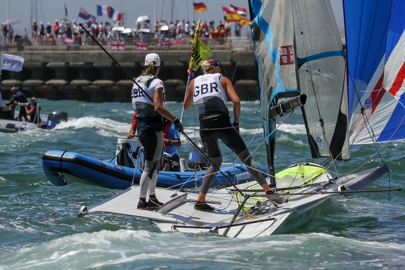 GBR with supporters in the background - 49er FX- Tokyo2020 - Day 9- August 2, - Enoshima, Japan. - photo © Richard Gladwell - Sail-World.com / Photosport