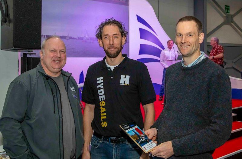 (L-R) Rich Thoroughgood of Seldén with Ben McGrane and Roger Gilbert who won overall in the Seldén SailJuice Winter Series photo copyright Tim Olin / www.olinphoto.co.uk taken at RYA Dinghy Show and featuring the 505 class