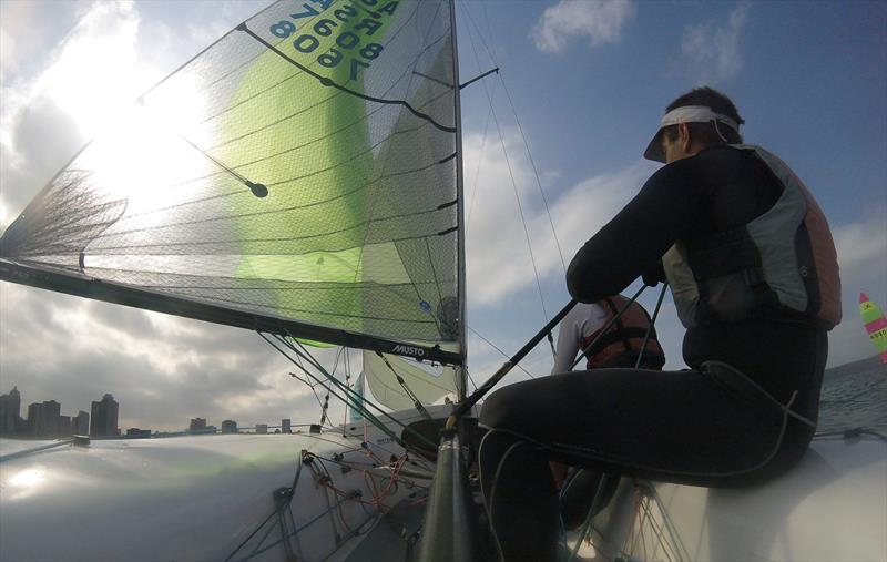 Gliding down to the bottom mark, Thomas Funke concentrates on flying his spinnaker during a regatta held in Durban - photo © Sophie Thompson