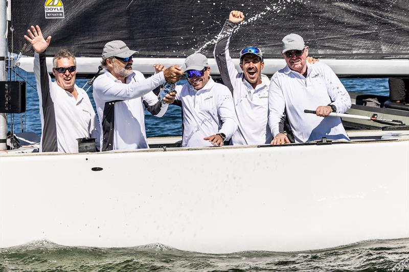 The crew of Momo II celebrate their 2025 Open Six Metre World Championship victory - photo © SailingShots by Maria Muiña