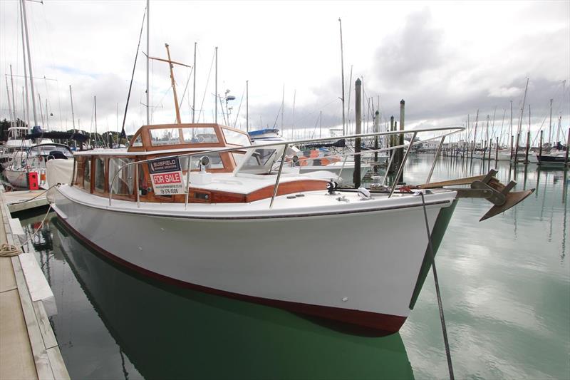 The Salthouse Classic 36 Kailua, a 1961 kauri beauty, carries her engine amidships to hold the heat and encloses her aft cockpit fully with clears - July 2026 - photo © Boatseekr.com