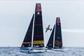 Dario Costa of Italy flies with the AC40s of Alinghi Red Bull Racing and Luna Rossa Prada Pirelli prior to the 37th Americs Cup Preliminary Regatta in Villanova © Samo Vidic / Alinghi Red Bull Racing