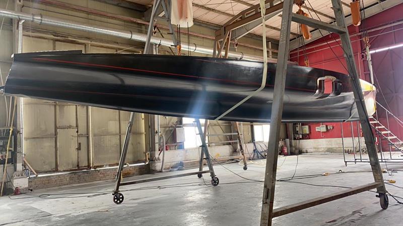 First AC40 is taken from the mould at McConaghy Boats, China - April 2022 - photo © Emirates Team New Zealand