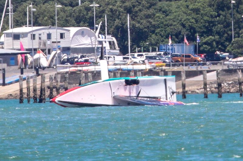 15. LEQ12  comes to a rest with the mast as support - Emirates Team NZ -  AC40-1|LEQ12 - January 23, 2023 - Waitemata Harbour photo copyright Richard Gladwell - Sail-World.com/nz taken at Royal New Zealand Yacht Squadron and featuring the AC40 class