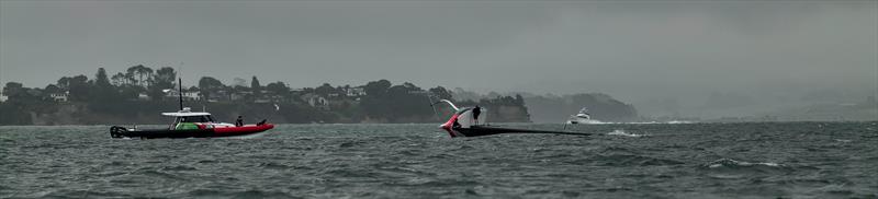 Emirates Team New Zealand - AC40 - OD capsize after striking a UFO - Hauraki Gulf - February 3, 2023 photo copyright Adam Mustill / America's Cup taken at Royal New Zealand Yacht Squadron and featuring the AC40 class