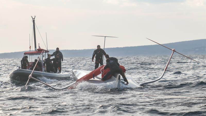 1607hrs: Bags being taken aboard - also shown is the relative angles of the foil arms - boat is not heeled significantly - LEQ12 -  February 8, 2023 - Mallorca - photo © Ugo Fonolla / America's Cup