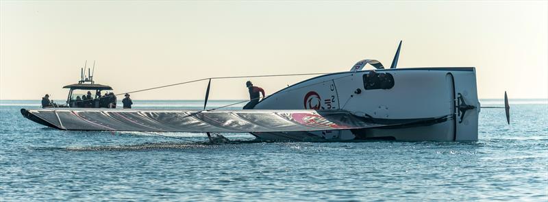 Capsize test - Alinghi Red Bull Racing - AC40 - Day 4 - February 17, 2023 photo copyright Alex Carabi / America's Cup taken at Société Nautique de Genève and featuring the AC40 class