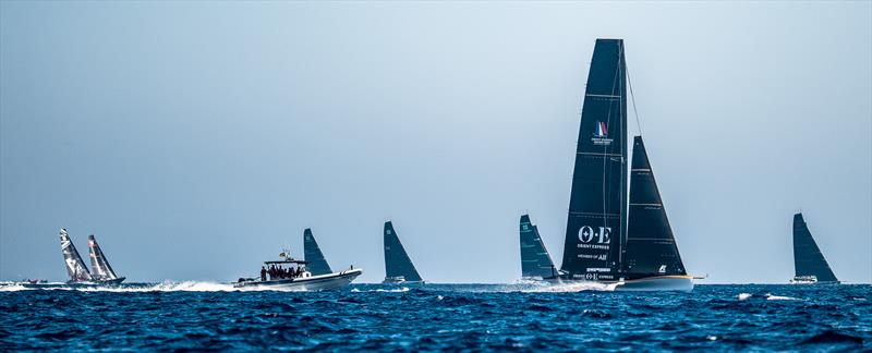 Orient Express Racing Team and TP52 Worlds fleet - AC40 - Day 2 - Barcelona - August 24, 2023 photo copyright Alex Carabi / America's Cup taken at Société Nautique de Genève and featuring the AC40 class