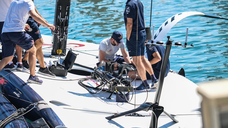 Technicians gathered around the starboard cockpit. Alinghi Red Bull Racing - AC40 - Day 54 - Barcelona - September 23, 2023 - photo © Alex Carabi / America's Cup