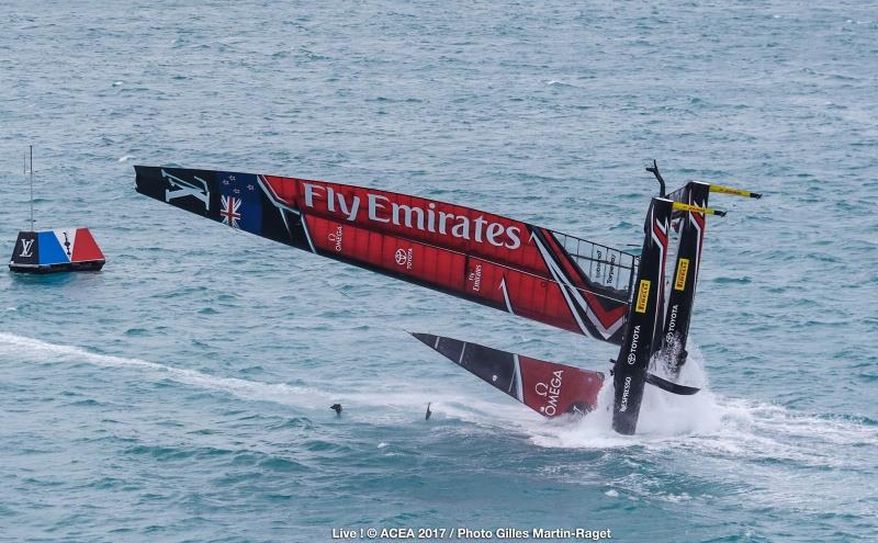 Emirates Team New Zealand capsize on the second day of the Louis Vuitton America's Cup Challenger Playoffs photo copyright ACEA 2017 / Gilles Martin-Raget taken at  and featuring the AC50 class