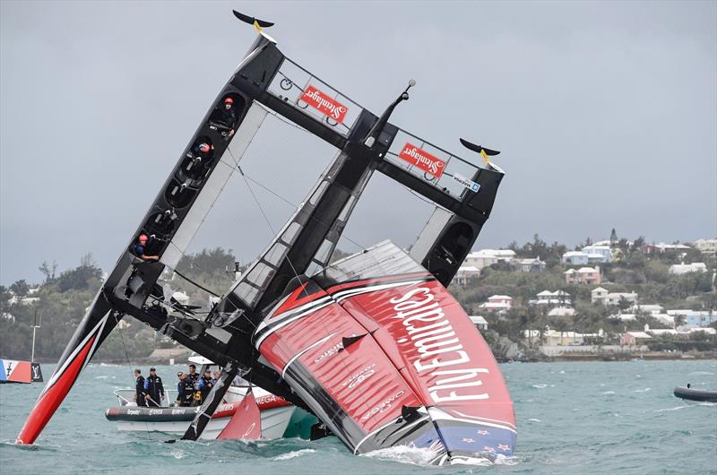 Emirates Team New Zealand capsize on the second day of the Louis Vuitton America's Cup Challenger Playoffs photo copyright ACEA 2017 / Ricardo Pinto taken at  and featuring the AC50 class