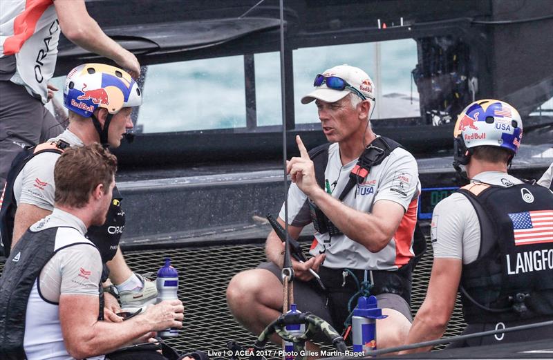 ORACLE TEAM USA Coach Philippe Presti talks to Jimmy Spithill, Tom Slingsby and Kyle Langford on day 3 of the 35th America's Cup Match - photo © ACEA 2017 / Gilles Martin-Raget