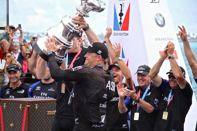 Skipper Glenn Ashby and helmsman Peter Burling lift the America's Cup for the first time in Bermuda photo copyright Richard Gladwell taken at  and featuring the AC50 class