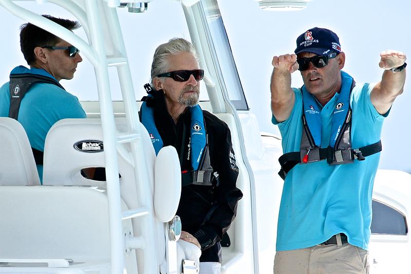 Russell Coutts explains a point to actor Michael Douglas - Qualifiers - Day 1, 35th America's Cup, Bermuda, May 27, 2017 photo copyright Richard Gladwell taken at  and featuring the AC50 class