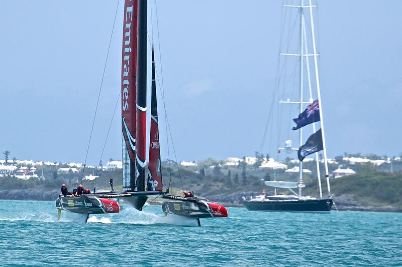 Emirates Team New Zealand pulls off a foiling tack with `Imagine` in the background - America's Cup Qualifier - Day 3, May 29, 2017 photo copyright Richard Gladwell taken at  and featuring the AC50 class
