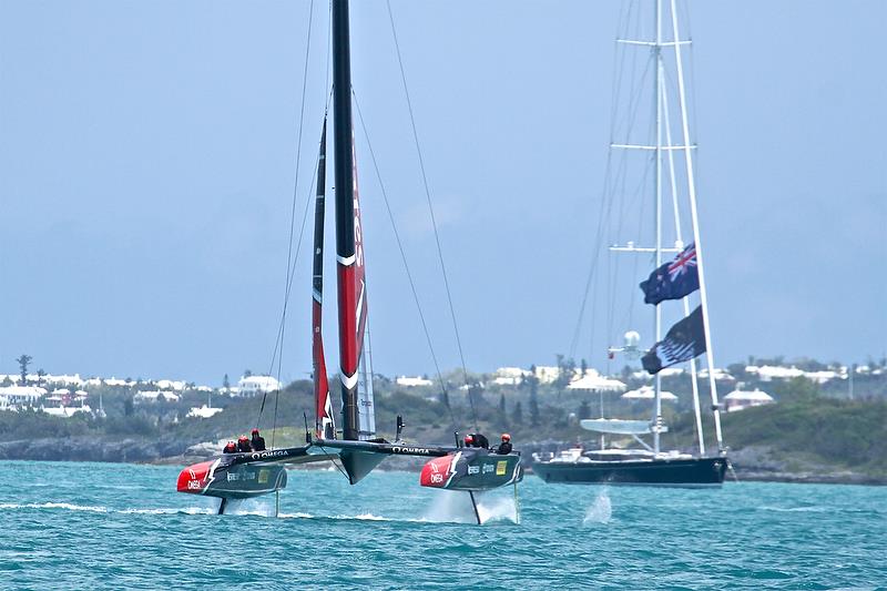 Emirates team New Zealand completes a foiling tack with `Imagine` in the background - Race 14 - America's Cup Qualifier - Day 3, May 29, 2017 photo copyright Richard Gladwell taken at  and featuring the AC50 class
