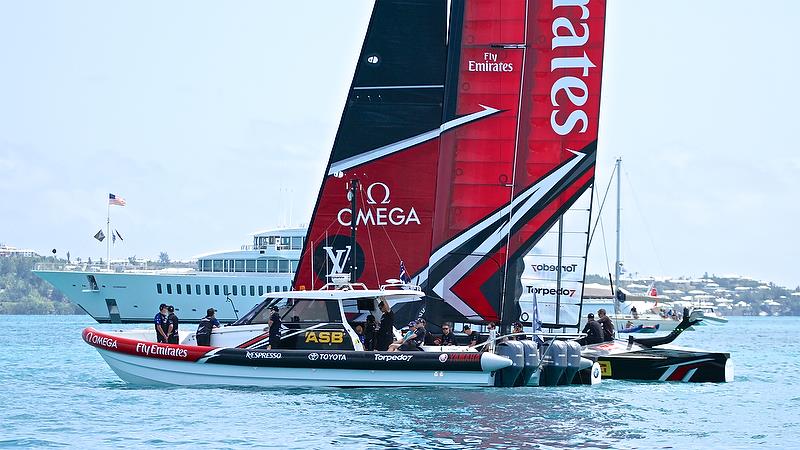 Emirates Team NZ dwarfed by Larry Ellison's Superyacht - Round Robin2, America's Cup Qualifier - Day 5, May 31, 2017 (ADT) - photo © Richard Gladwell