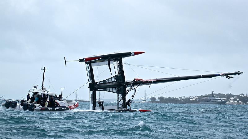 Emirates Team New Zealand - recovery - power goes on from the chase boat and the AC50 starts to come upright - Race 4 - Semi-Finals, America's Cup Playoffs- Day 11, June 6, 2017 (ADT) photo copyright Richard Gladwell taken at  and featuring the AC50 class