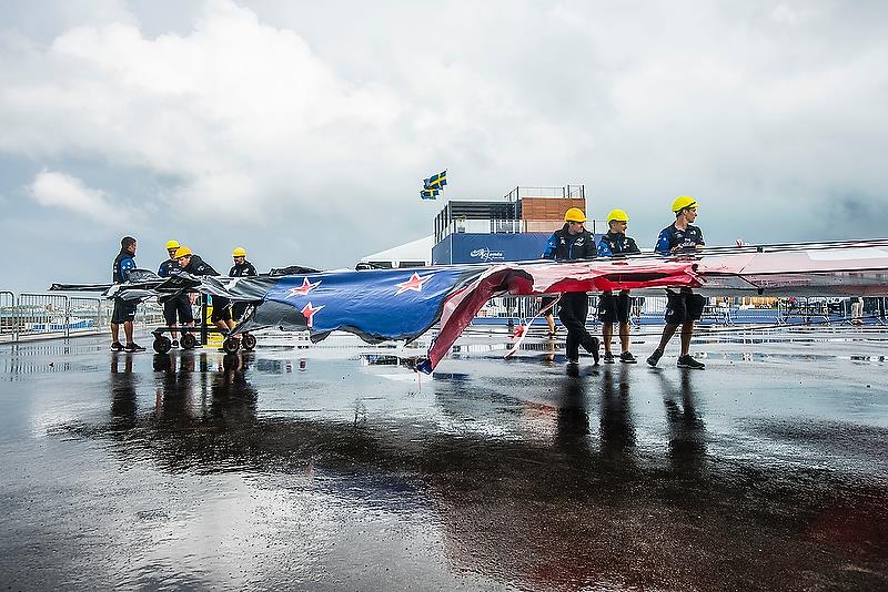 Checking the wingsail - after Emirates Team New Zealand's nosedive - June 6, 2018. Semi-Final 4, America's Cup Playoffs photo copyright Richard Gladwell taken at  and featuring the AC50 class