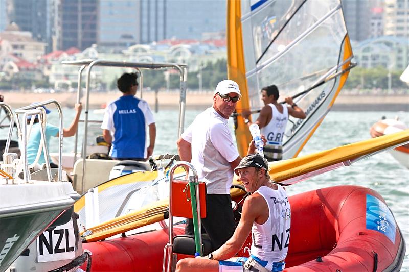 Tom Ashley with coach Grant Beck reflects on his Gold Medal win, New Zealand's first since 1992 photo copyright Richard Gladwell taken at  and featuring the AC50 class