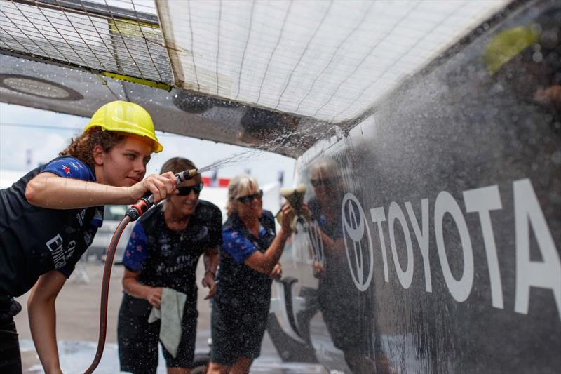 Design team and Support team lend a hand to wash down the AC50 during the Challenger Series photo copyright Emirates Team New Zealand taken at Royal New Zealand Yacht Squadron and featuring the AC50 class