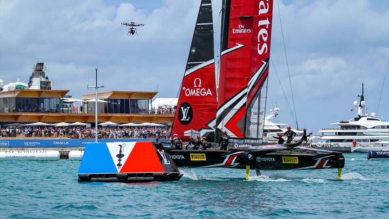 Emirates Team New Zealand crosses the finish line in Bermuda to win the 35th America's Cup. - photo © Richard Gladwell / Sail-World.com