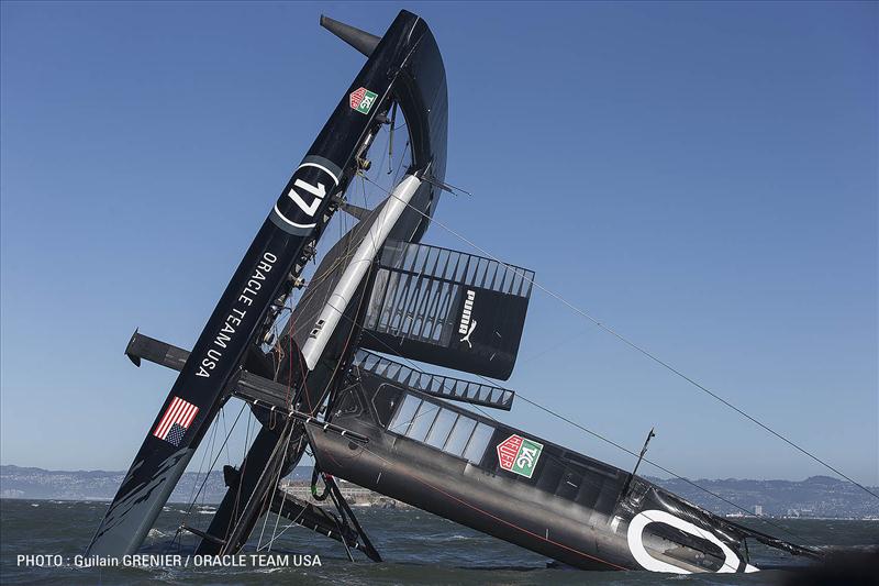 ORACLE TEAM USA 17 AC72 capsizes in San Francisco Bay photo copyright Guilain Grenier / ORACLE TEAM USA taken at  and featuring the AC72 class