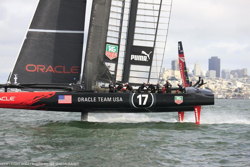 ORACLE TEAM USA win race 13 of the 34th America's Cup photo copyright Gilles Martin-Raget / ACEA taken at  and featuring the AC72 class