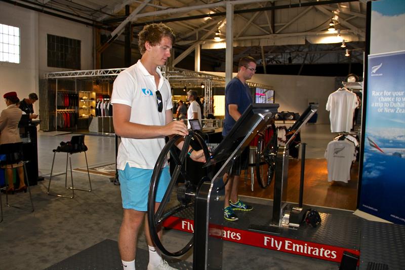 Driving the simulator, inside one of the New Zealand pavilllons America's Cup 2013, San Francisco photo copyright Richard Gladwell taken at Takapuna Boating Club and featuring the AC72 class