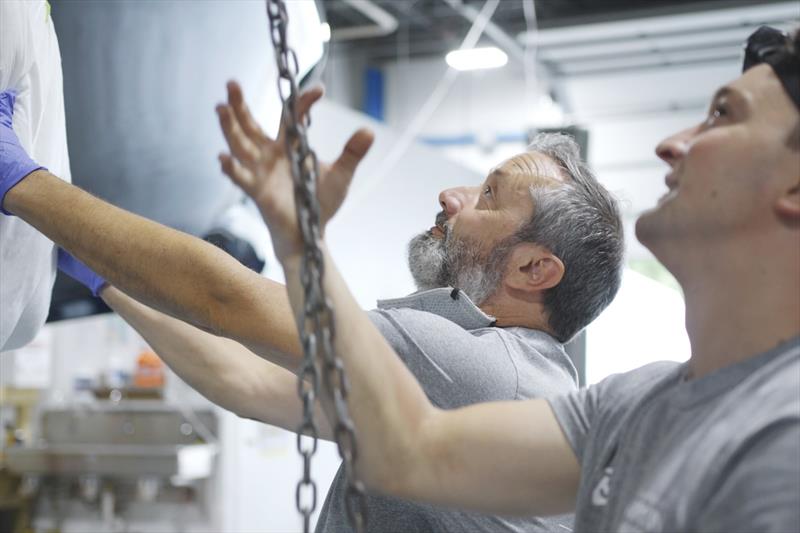 Boatbuilders Eduardo Baduel (left) and Phil Wells working in the team's shop in Bristol. The AC75's were built just three miles from the Herreshoff Marine Museum and the America's Cup Hall of Fame - photo © Sebastian Slayter