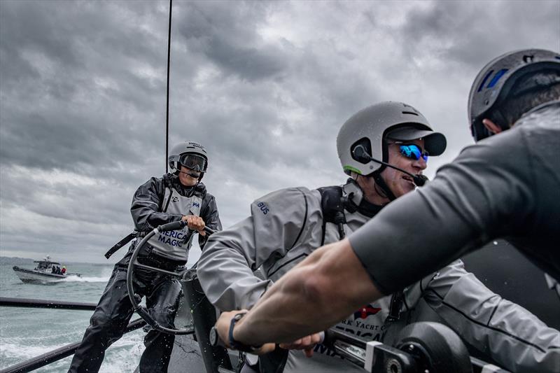 Helmsman Dean Barker, Skipper/Tactician Terry Hutchinson (center), grinder Trevor Burd (right), and eight others onboard put DEFIANT through her paces on the Waitemata Harbor photo copyright American Magic / Will Ricketson taken at  and featuring the AC75 class