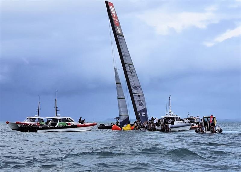 The America's Cup support teams work together to save NYYC American Magic's Patriot after a huge capsize on day 3 of the PRADA Cup - photo © Richard Gladwell / Sail-World.com