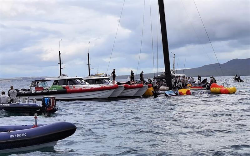 The America's Cup support teams work together to save NYYC American Magic's Patriot after a huge capsize on day 3 of the PRADA Cup - photo © Richard Gladwell / Sail-World.com