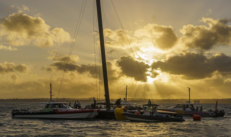 The America's Cup support teams work together to save NYYC American Magic's Patriot after a huge capsize on day 3 of the PRADA Cup - photo © COR36 / Studio Borlenghi