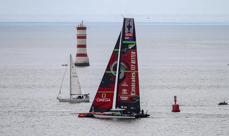 Emirates Team New Zealand  chasing the wind - the water is glassy on the top of shot - September 19, 2019 photo copyright Richard Gladwell taken at  and featuring the AC75 class