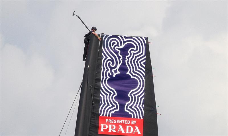 Emirates Team New Zealand - Crew member works on top of mast - Waitemata Harbour - Day 3 - September 19, 2019, - photo © Richard Gladwell