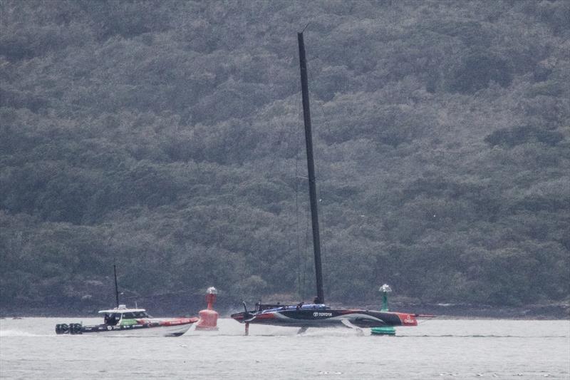 Emirates Team New Zealand tows home after a premtaure end to their training session on the Hauraki Gulf, October 8, 2019 - photo © Richard Gladwell