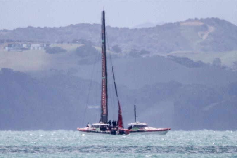A conflab on the foredeck of 'Te Aihe' after training in 'The Paddock` off Eastern Beach, Auckland - December 9, 2019 photo copyright Richard Gladwell / Sail-World.com taken at Royal New Zealand Yacht Squadron and featuring the AC75 class