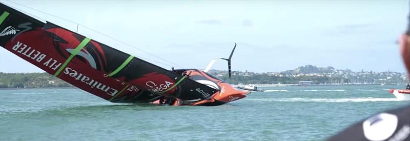 Tow rope is attached and the righting process begins - Emirates Team New Zealand AC75, Te Aihe, capsize - December 19, 2019 - photo © Emirates Team New Zealand