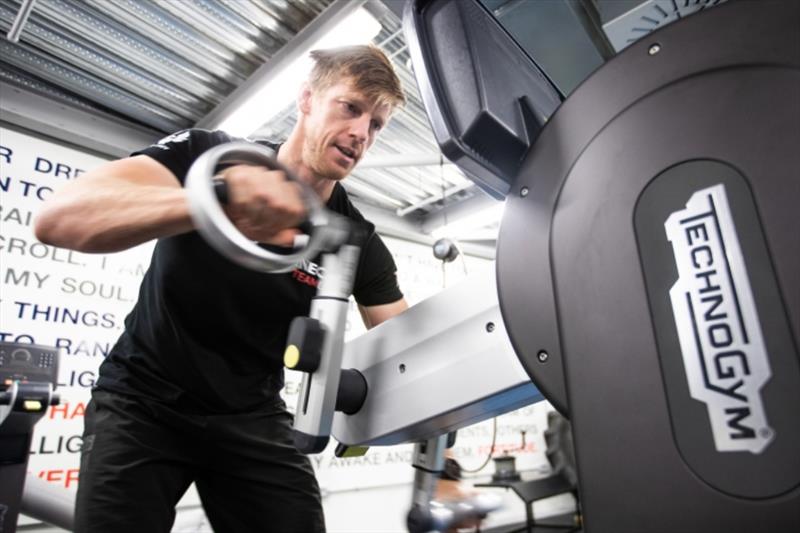 Graeme Spence spinning handles on the land based grinding machine - photo © Harry KH / INEOS TEAM UK