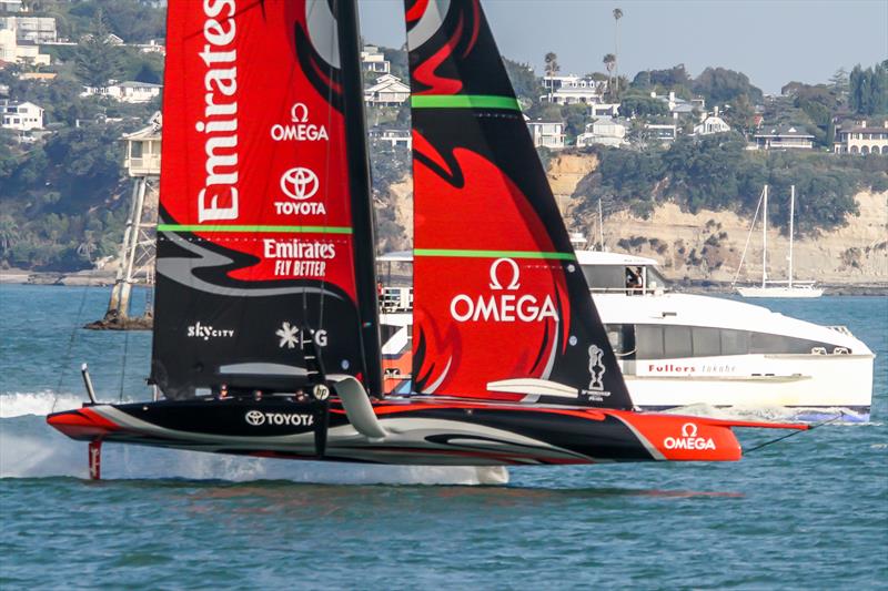 Emirates Team NZ's AC75 Te Aihe races past a fast ferry on her final day on the Waitemata Harbour - January 2020 - Auckland - photo © Richard Gladwell / Sail-World.com