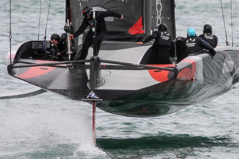 Stern shot of Te Aihe showing the difference between the scow shape of Defiant and the skiff genre of Te Aihe. The mainboom sheeting is also quite different photo copyright Richard Gladwell / Sail-World.com taken at Royal New Zealand Yacht Squadron and featuring the AC75 class