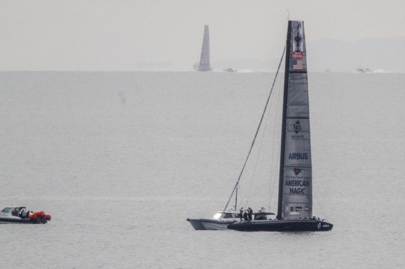 American Magic's Defiant with Emirates Team NZ's Te Aihe sailing in the background - August 10, 2020 - Hauraki Gulf - 36th America's Cup - photo © Richard Gladwell / Sail-World.com