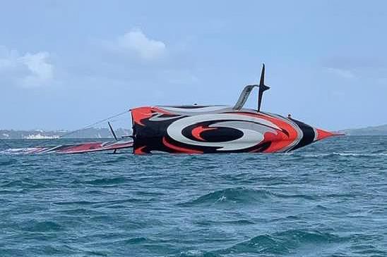 Te Aihe - Emirates Team New Zealand - capsize - October 10, 2020 photo copyright Rod Slater taken at Murrays Bay Sailing Club and featuring the AC75 class