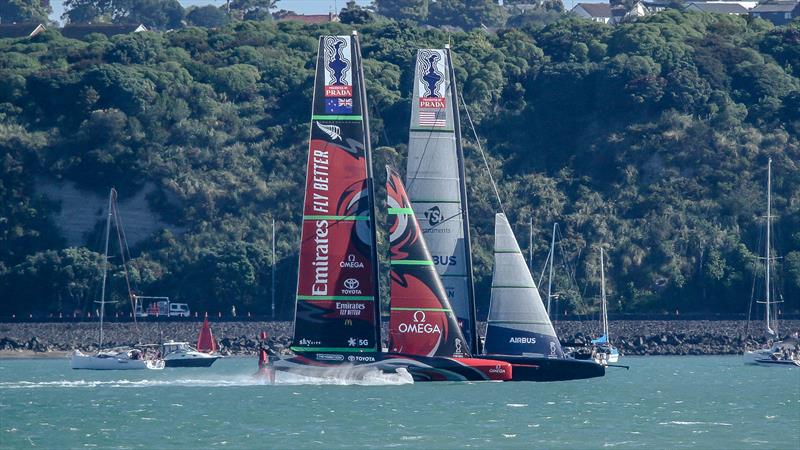 ETNZ and American Magic at the end of Leg 5, Match 4 - America's Cup World Series - Day 1 - Waitemata Harbour - December 17, 2020 - 36th Americas Cup presented by Prada photo copyright Richard Gladwell / Sail-World.com taken at Royal New Zealand Yacht Squadron and featuring the AC75 class