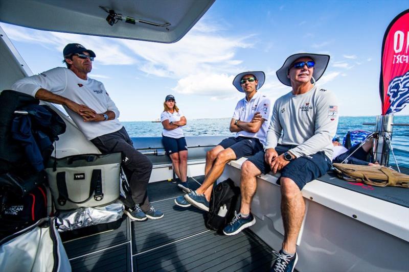 Marcelino Botin (Principal Designer), Elvira Llabres (Mechatronics), Adolfo Carrau (Design Coordinator), and Terry Hutchinson (Skipper and Executive Director) watch a slow Race 1 between INEOS Team UK and ETNZ photo copyright Sailing Energy / American Magic taken at  and featuring the AC75 class
