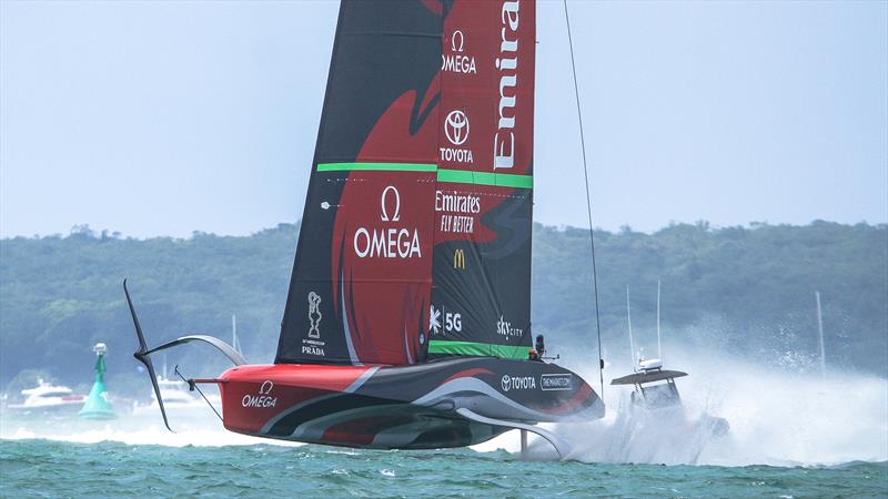 Te Rehutai sprays the umpire boat -  Emirates Team New Zealand - December 18, 2020 - Waitemata Harbour - America's Cup 36 photo copyright Richard Gladwell / Sail-World.com taken at Royal New Zealand Yacht Squadron and featuring the AC75 class